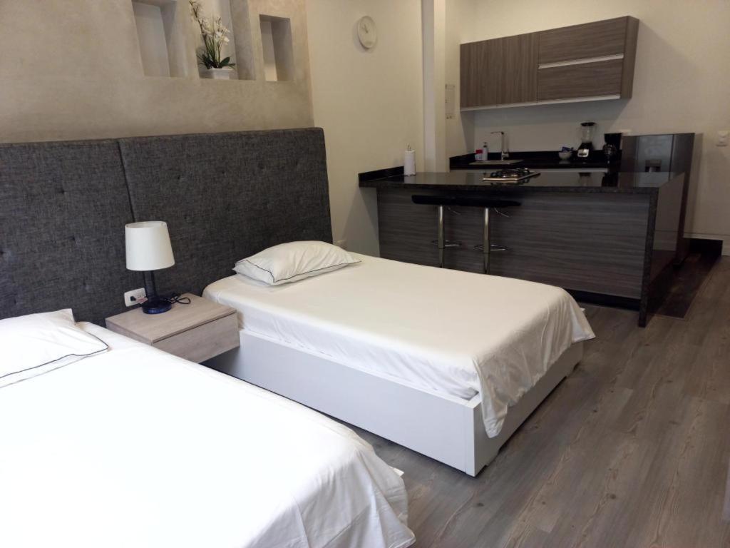 Edificio Lotus Loft Apartment กาลี ภายนอก รูปภาพ
